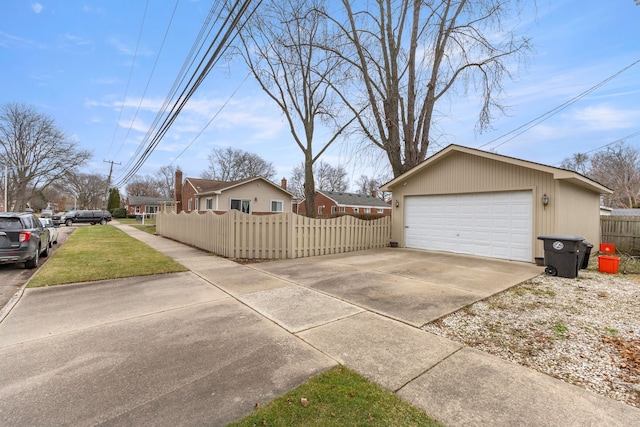 view of property exterior with a garage