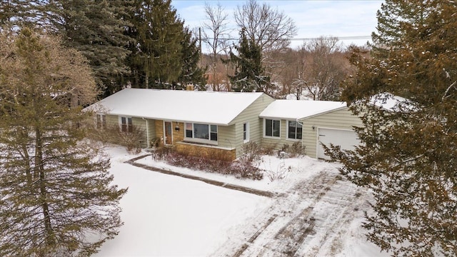 view of front of property featuring a garage