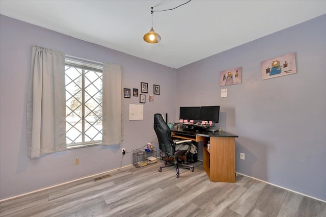 office area with light wood-type flooring