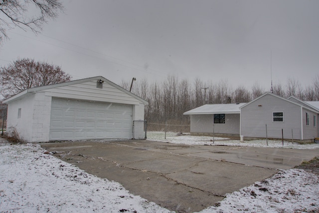 view of snow covered garage