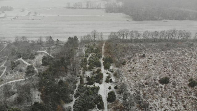 birds eye view of property featuring a rural view