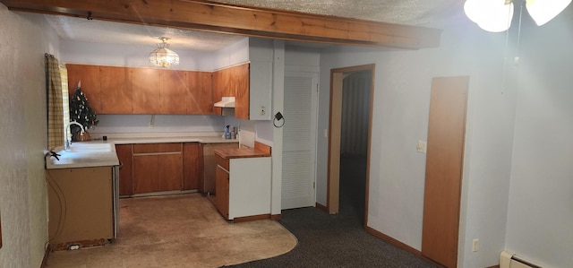 7981 W Main St, Kalamazoo, MI 49009 - kitchen featuring baseboard heating, hanging light fixtures, and sink