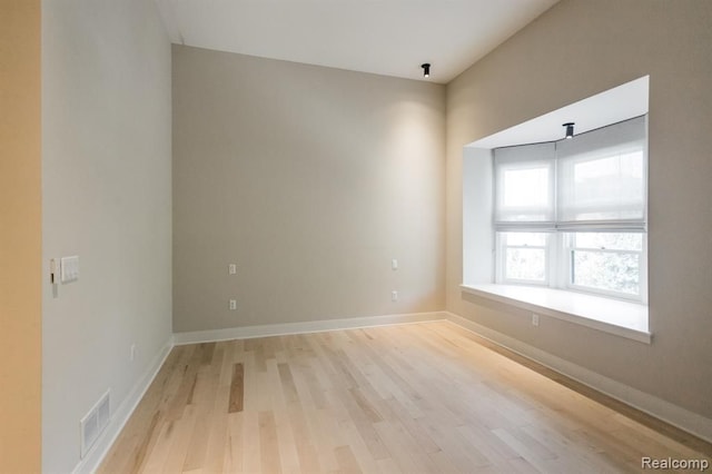 empty room with light wood-type flooring