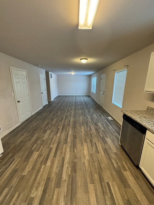 basement featuring dark hardwood / wood-style floors