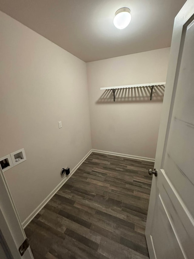 washroom with washer hookup and dark wood-type flooring