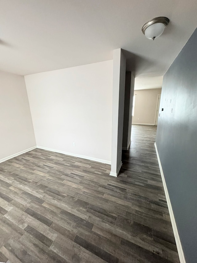 hall featuring dark wood-type flooring