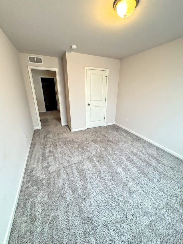 empty room featuring carpet floors