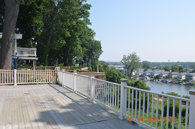 1511 Bernice Ave, Saint Joseph, MI 49085 - wooden deck featuring a water view and a residential view