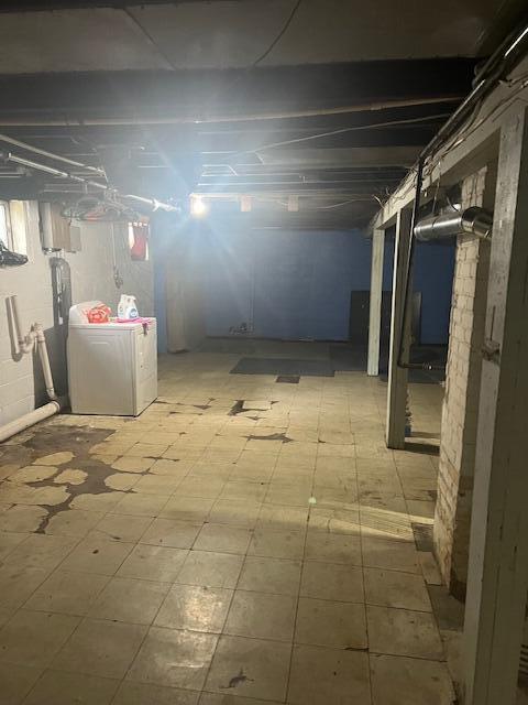 unfinished basement with tile patterned floors