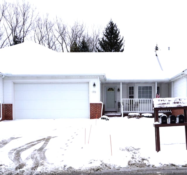 ranch-style house featuring a garage