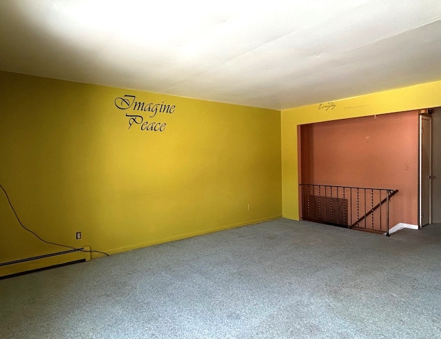 unfurnished room featuring carpet flooring