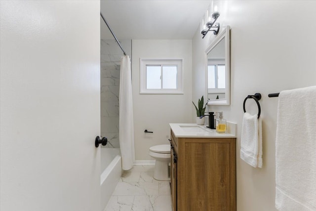 bathroom featuring vanity, baseboards, shower / bath combo, toilet, and marble finish floor