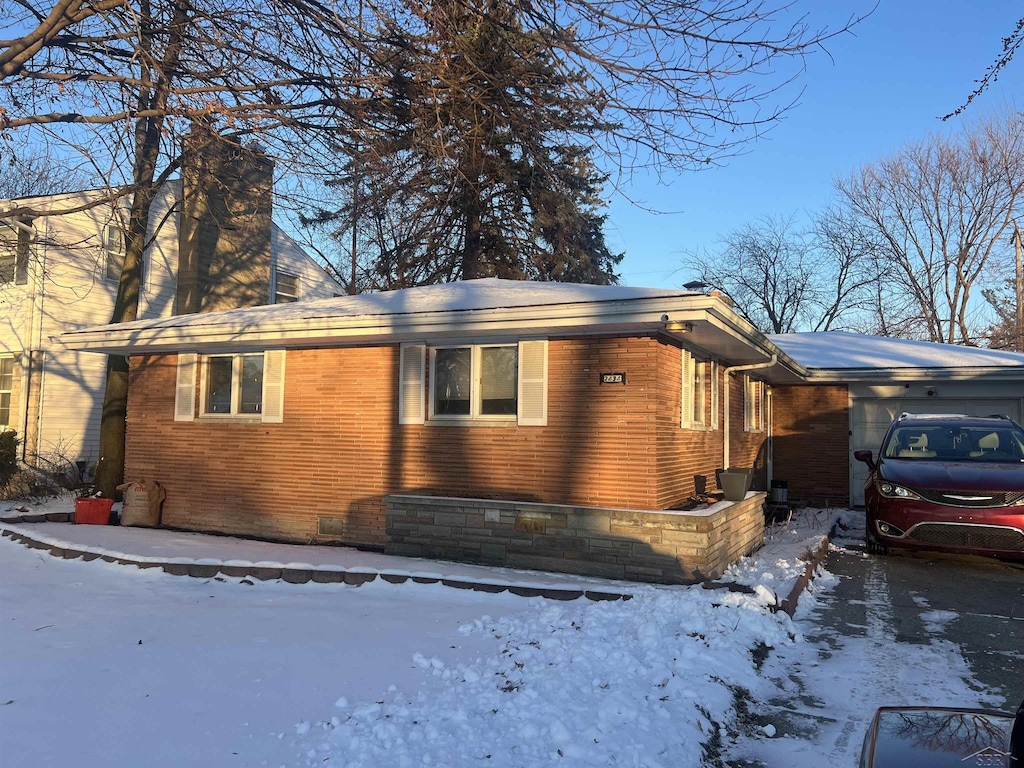 view of snow covered property