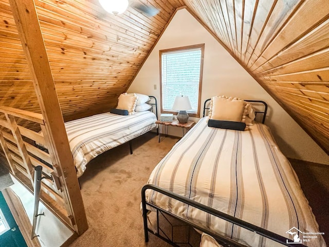 bedroom with wooden ceiling, lofted ceiling, and carpet flooring