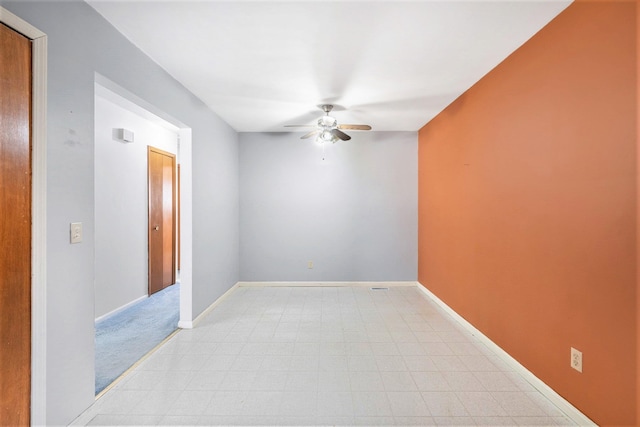 unfurnished room featuring ceiling fan