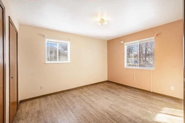 unfurnished bedroom featuring light hardwood / wood-style flooring