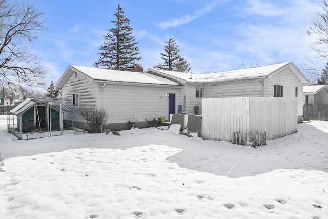 view of snow covered property