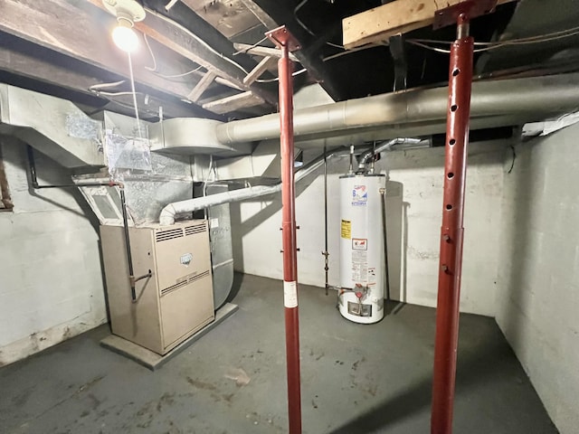 utility room featuring water heater