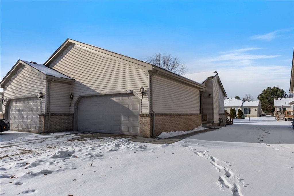 view of snow covered property