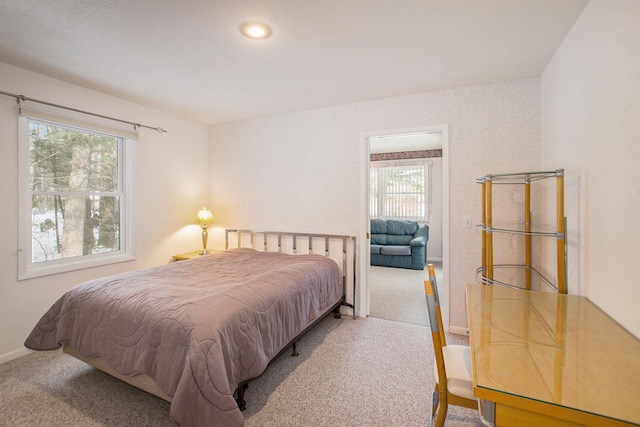 bedroom with light colored carpet