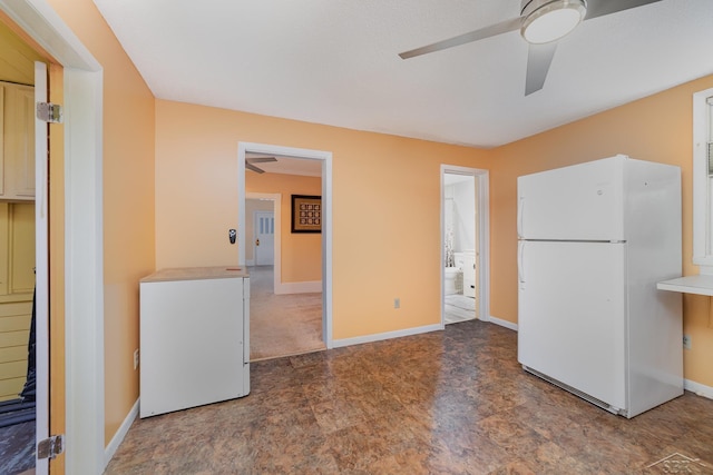 kitchen featuring ceiling fan, fridge, and white refrigerator