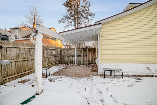 view of snow covered patio