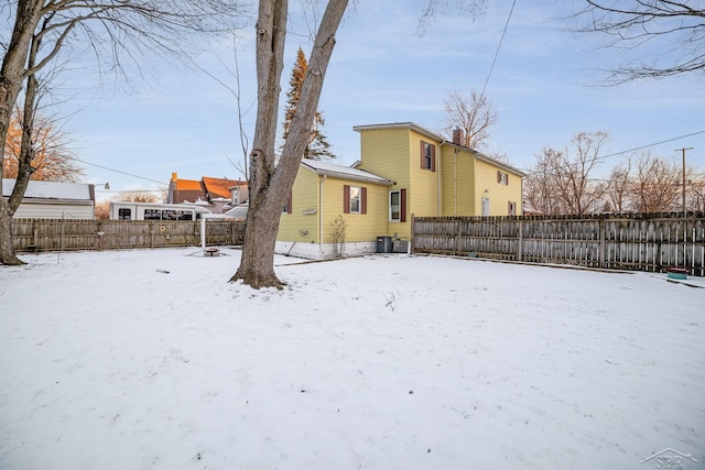 view of yard covered in snow