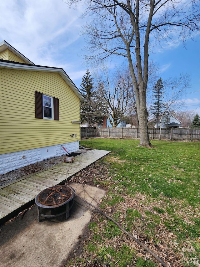 1454 Vermont St, Saginaw, MI 48602 - view of yard featuring a fire pit, a patio, and fence private yard
