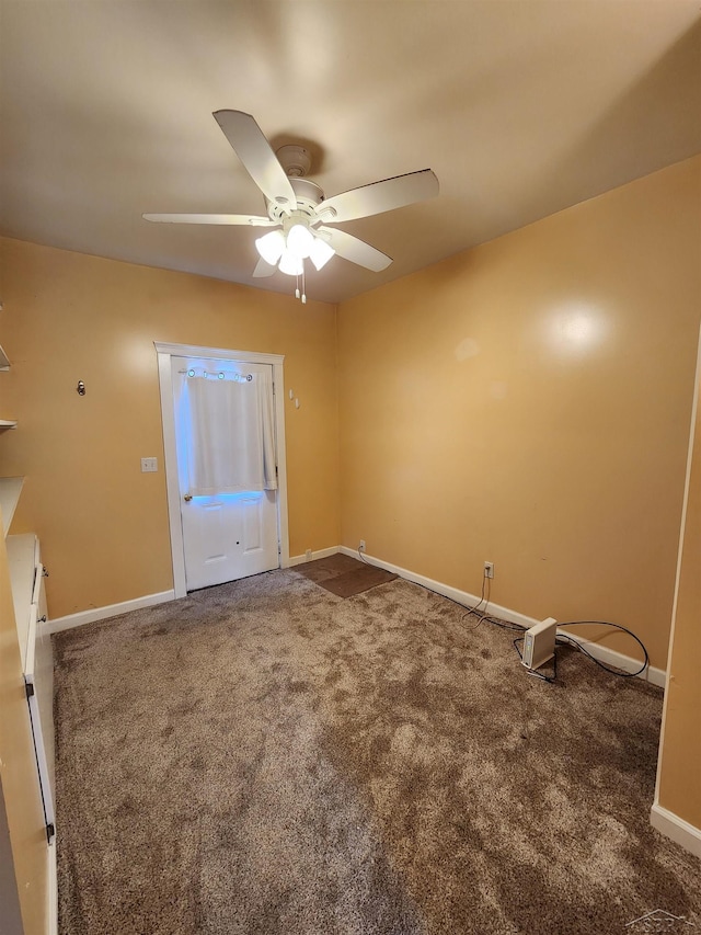 1454 Vermont St, Saginaw, MI 48602 - carpeted spare room featuring baseboards and a ceiling fan