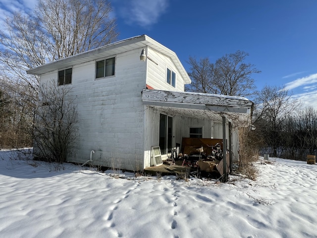 view of snow covered property