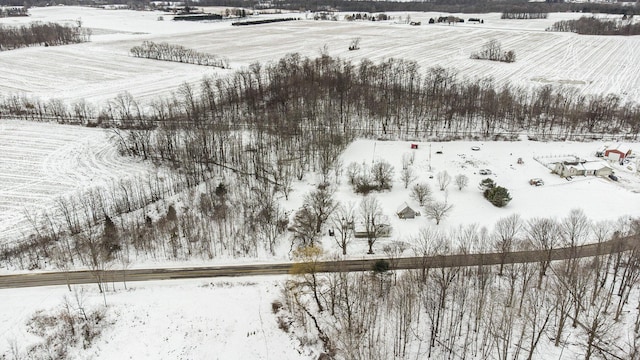 snowy aerial view with a rural view