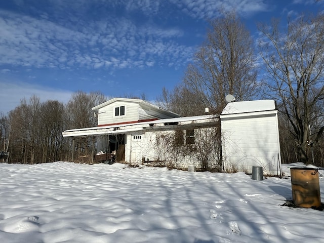 view of snow covered property