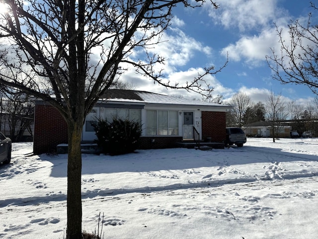 view of snow covered property