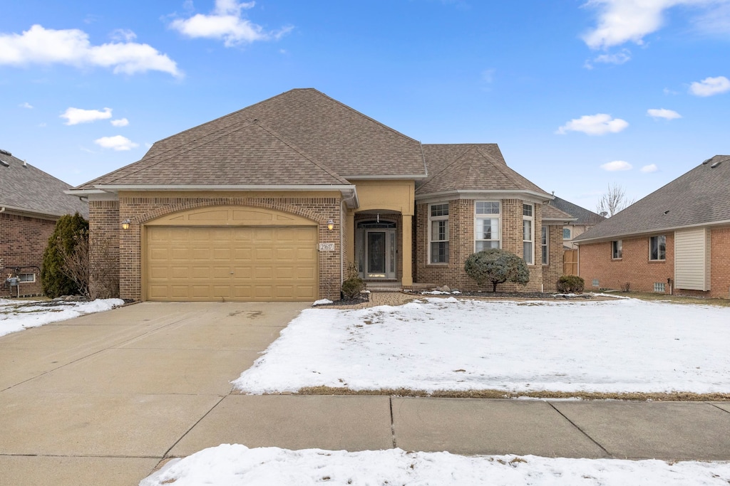 view of front of home with a garage