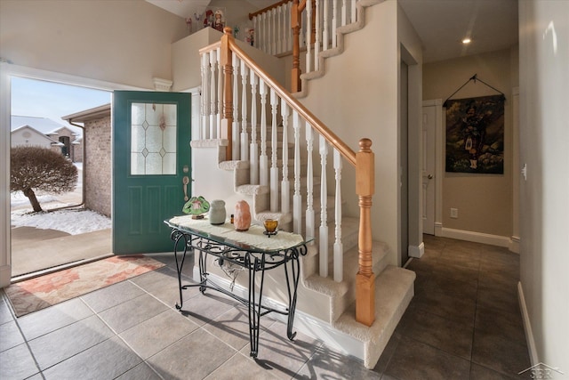 entryway with tile patterned floors