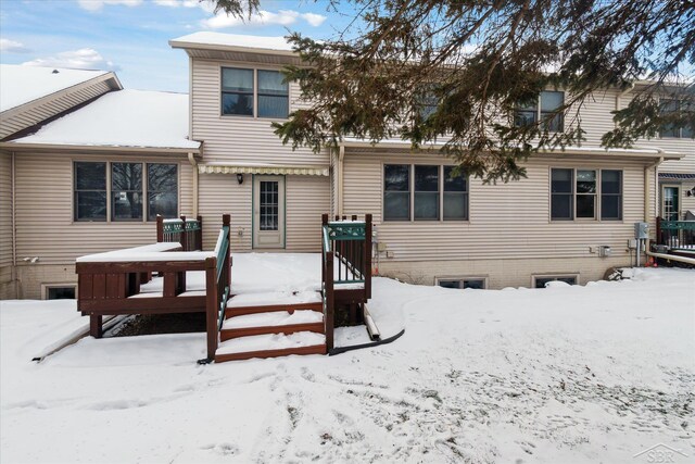 view of snow covered house