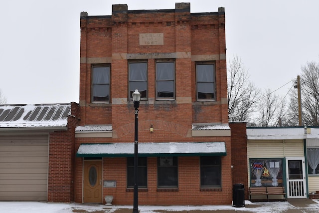 view of snow covered building