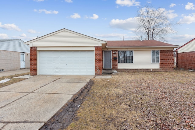 single story home featuring brick siding, driveway, and a garage