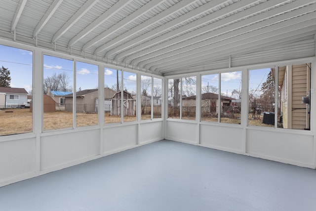 unfurnished sunroom with a residential view