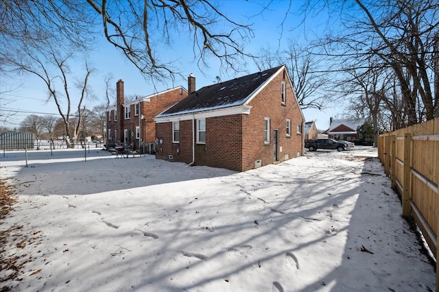 view of snow covered property