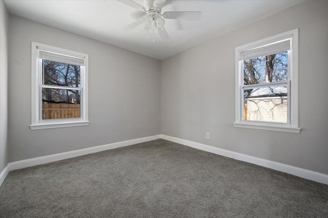 unfurnished room featuring ceiling fan, plenty of natural light, and carpet flooring