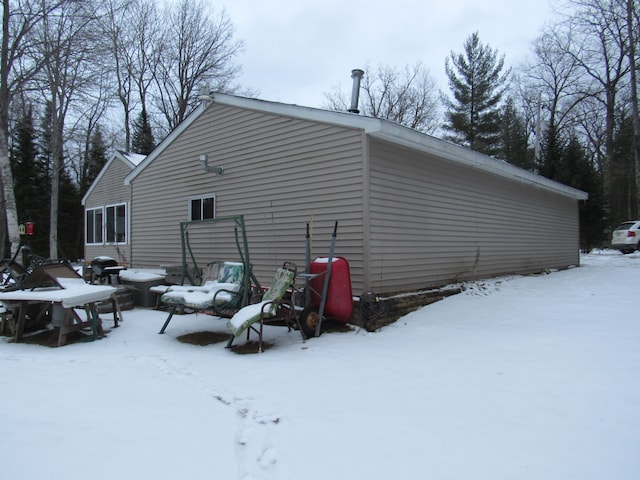 view of snow covered property