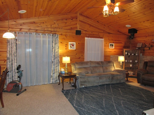 living room with carpet floors, vaulted ceiling, ceiling fan, and wood ceiling