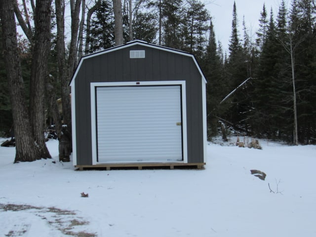 view of snow covered garage