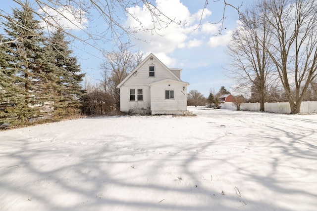 view of snow covered property