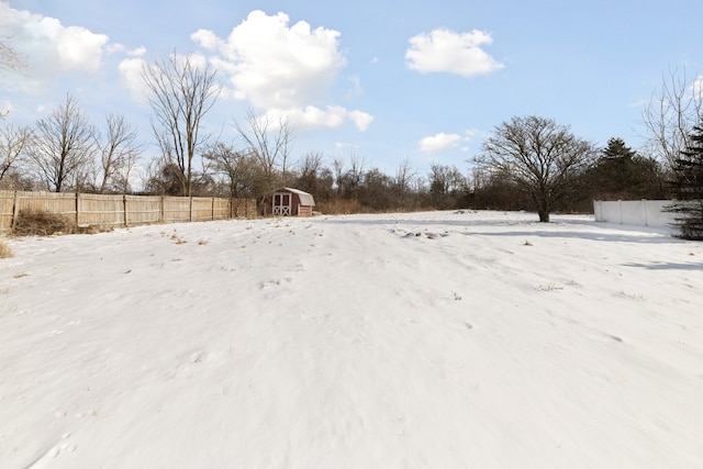 view of yard covered in snow