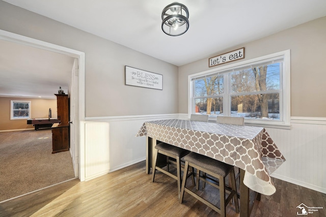 dining area with hardwood / wood-style floors