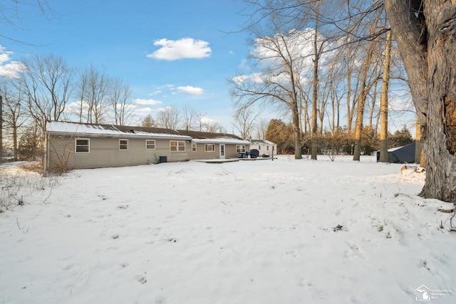 view of snow covered house