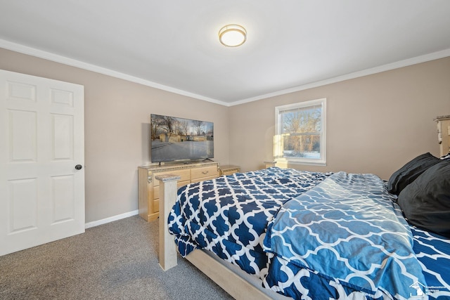 bedroom with carpet floors and crown molding