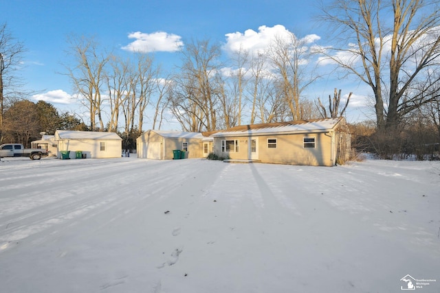 view of front facade with a shed